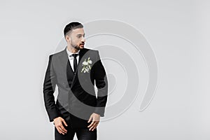 Muslim groom in suit and boutonniere