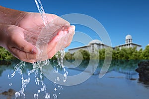 Muslim hands taking ablution