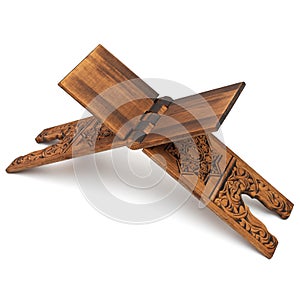 Muslim Holy book Quran rahle, wooden stand isolated on a white background