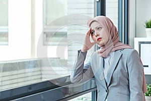 Muslim lady resting because of annoyed customer