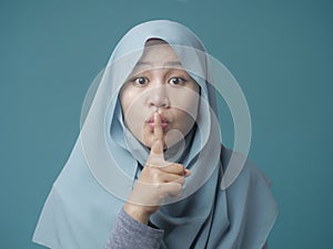 Muslim Lady Shushing Gesture