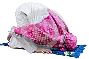 Muslim male posing prostration on studio