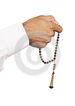 Muslim Male Wears White with Rosary