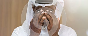 Muslim man having worship . Arab Muslim man praying in mosque stretching palms up. Moslem pray