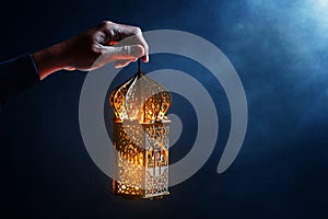 Muslim man hold arabic lantern