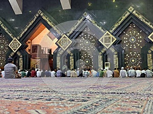 Muslim man praying in the mosque