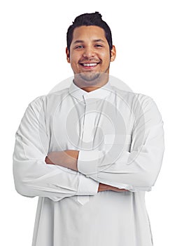 Muslim man, studio portrait and arms crossed isolated on white background for religion, arabic clothes and faith. Happy