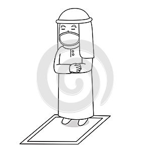 Muslim man use brown dress traditional muslim. tarawih praying in ramadan month, using mask and healthy protocol.Character photo