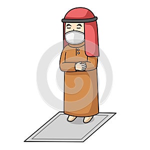 Muslim man use brown dress traditional muslim. tarawih praying in ramadan month, using mask and healthy protocol.Character photo