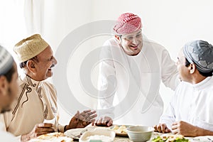 Muslim men celebrating ending of Ramadan