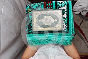 Muslim men Reading Holy Islamic Book Koran