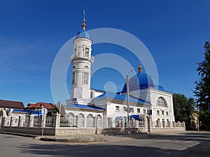 Muslim mosque against the blue sky