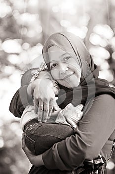 A Muslim mother with her baby
