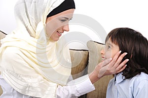 Muslim mother and son relaxing