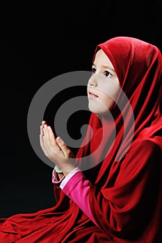 Muslim pray, little girl