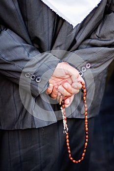 Muslim with prayer beads