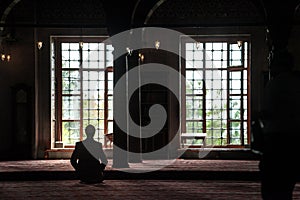 The muslim prayer for god in the mosque