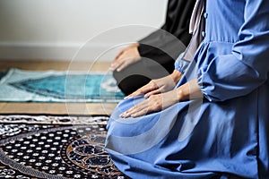 Muslim prayers in Tashahhud posture