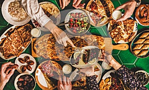 Muslim Ramadan iftar family dinner table with traditional Turkish foods