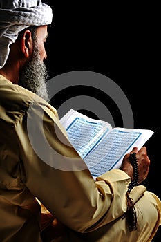 Muslim reading Koran