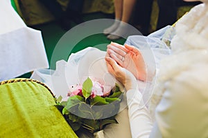 Muslim wedding rite. Bride and groom sitting on the floor in the moqsue. Muslim Wedding prayers. Nikah.