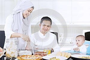 Muslim wife preparing meal for family