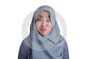 Muslim Woman Blowing or Puffing Cheek