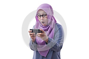 Muslim Woman Excited to Play Games on Phone