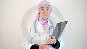 Muslim woman general practitioner enjoys working at hospital