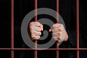 Muslim woman hand in jail