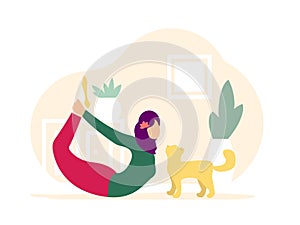 Muslim woman in hijab. Bow pose. Woman doing Yoga with cat