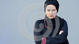 Muslim woman in hijab dissatisfied with country regime