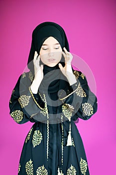 Muslim woman with hijab in modern dress