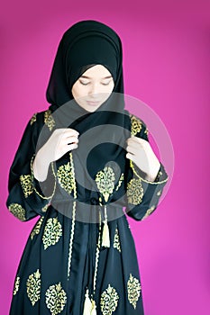 Muslim woman with hijab in modern dress