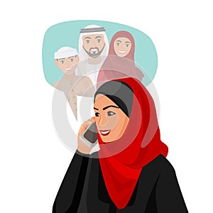 Muslim woman in hijab talking over phone with family