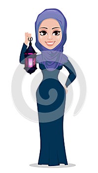 Muslim woman holding Arabic lantern