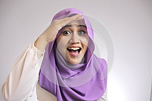 Muslim Woman Looking Far Ahead With Shocked Surprised Expression