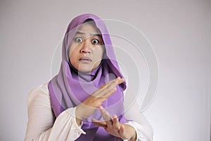 Muslim Woman Making Time Out Gesture