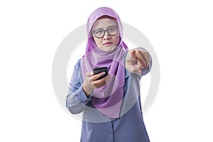 Muslim Woman Pointing at Camera with Angry Expression, Giving Warn
