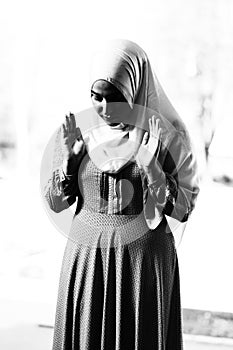 Muslim Woman Praying at the Mosque