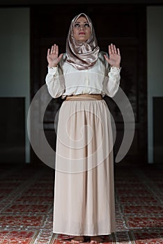 Muslim Woman Is Praying In The Mosque