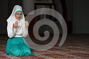 Muslim Woman Is Praying In The Mosque