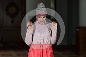 Muslim Woman Is Praying In The Mosque