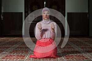 Muslim Woman Is Praying In The Mosque