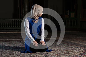 Muslim Woman Is Praying In The Mosque