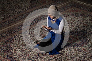 Muslim Woman Is Praying In The Mosque