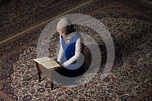 Muslim Woman Reading Holy Islamic Book Koran