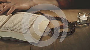 Muslim Woman Reading The Koran In Mosque