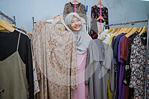 muslim woman shopping new dress for eid mubarak idul fitri