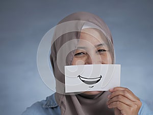 Muslim Woman With Smile Card